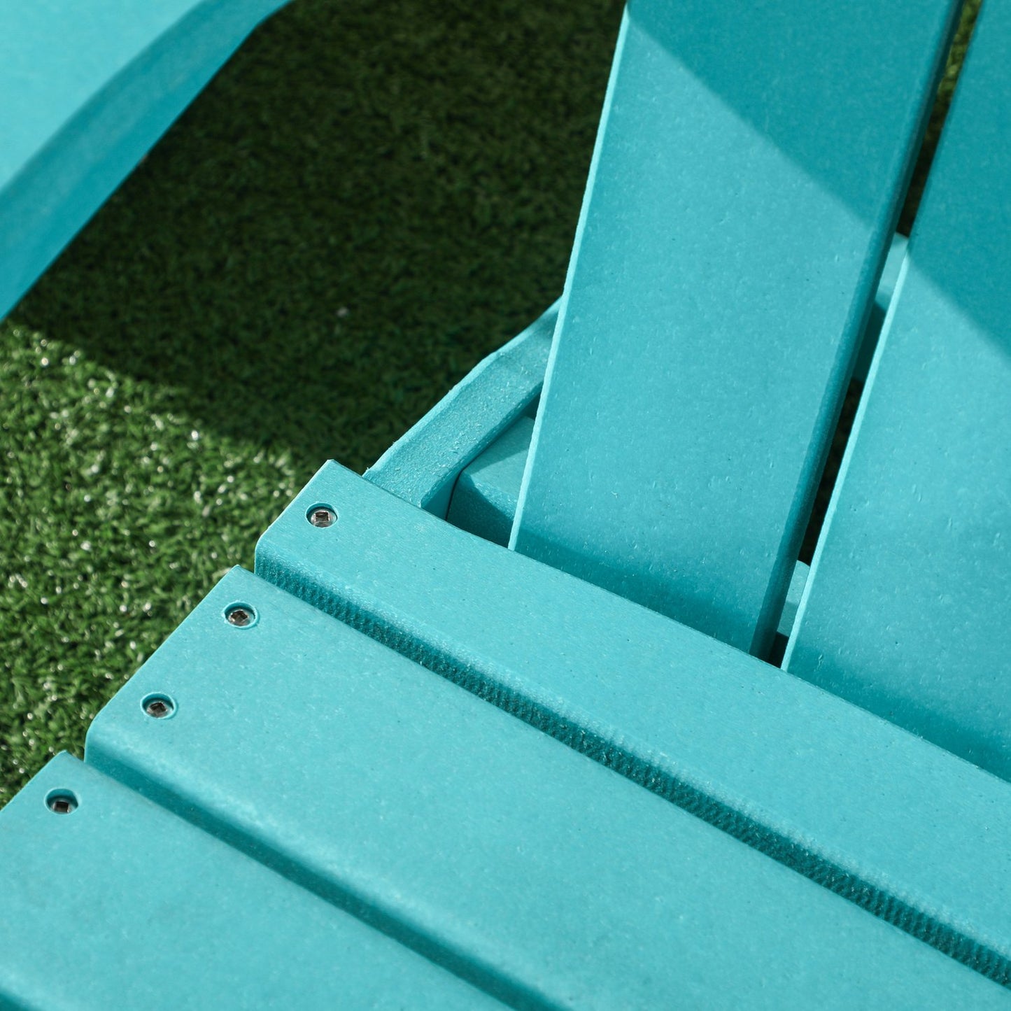 Children's teal Adirondack chair for ages 3+ with slatted design