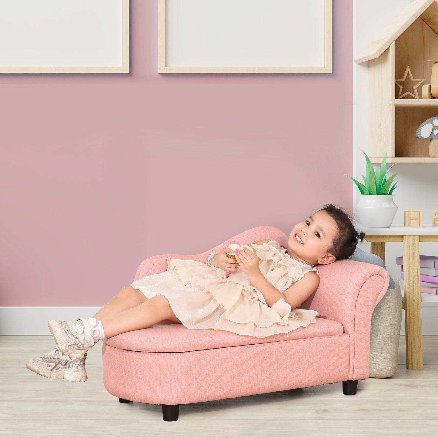 Pink sofa bed for children with storage, linen and wood