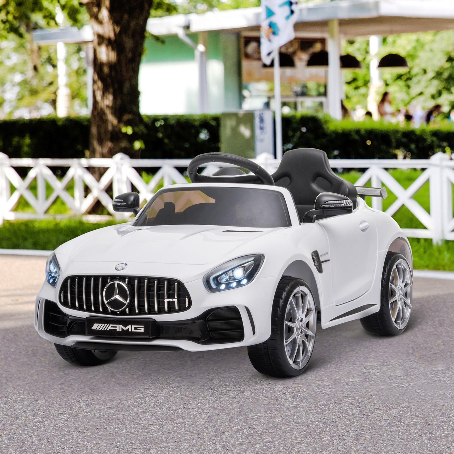 Electric ride-on car for children with remote control, lights and music