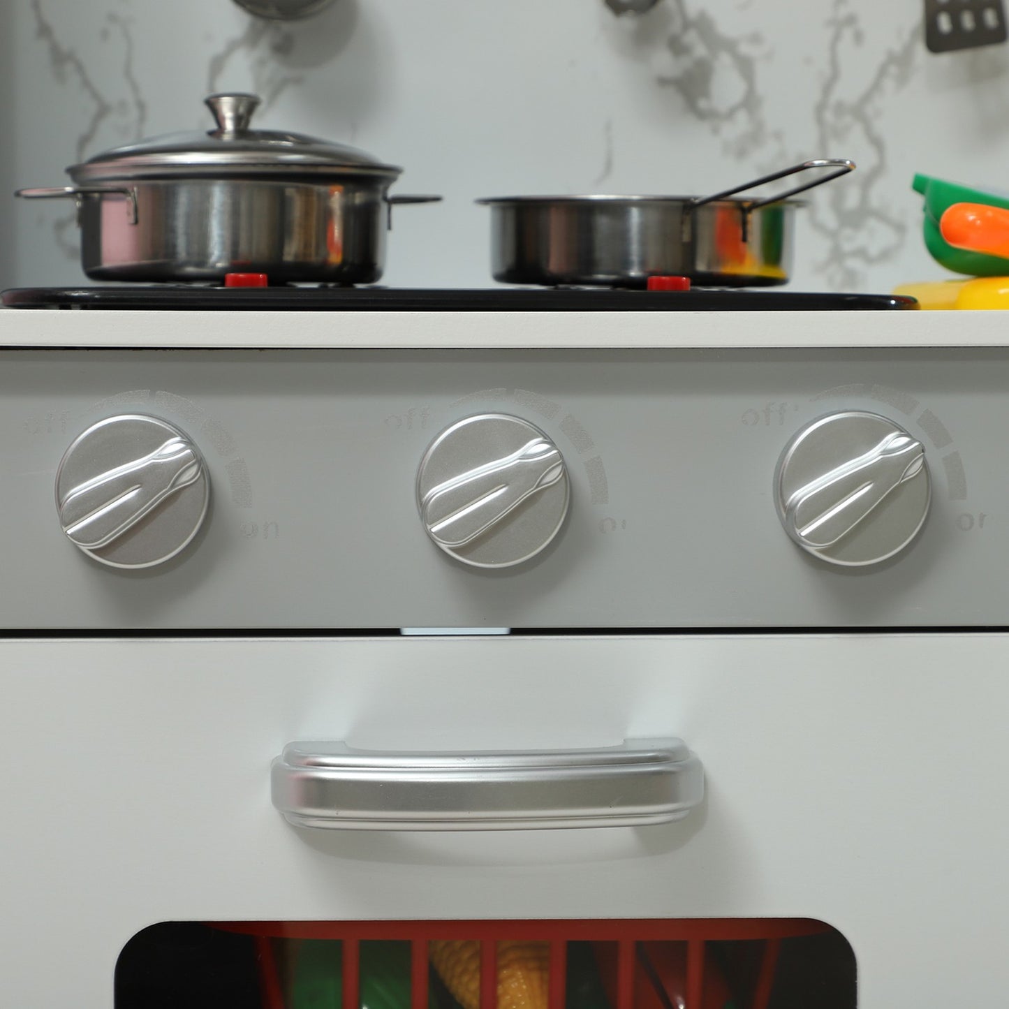 Adjustable play kitchen for children with stove and accessories