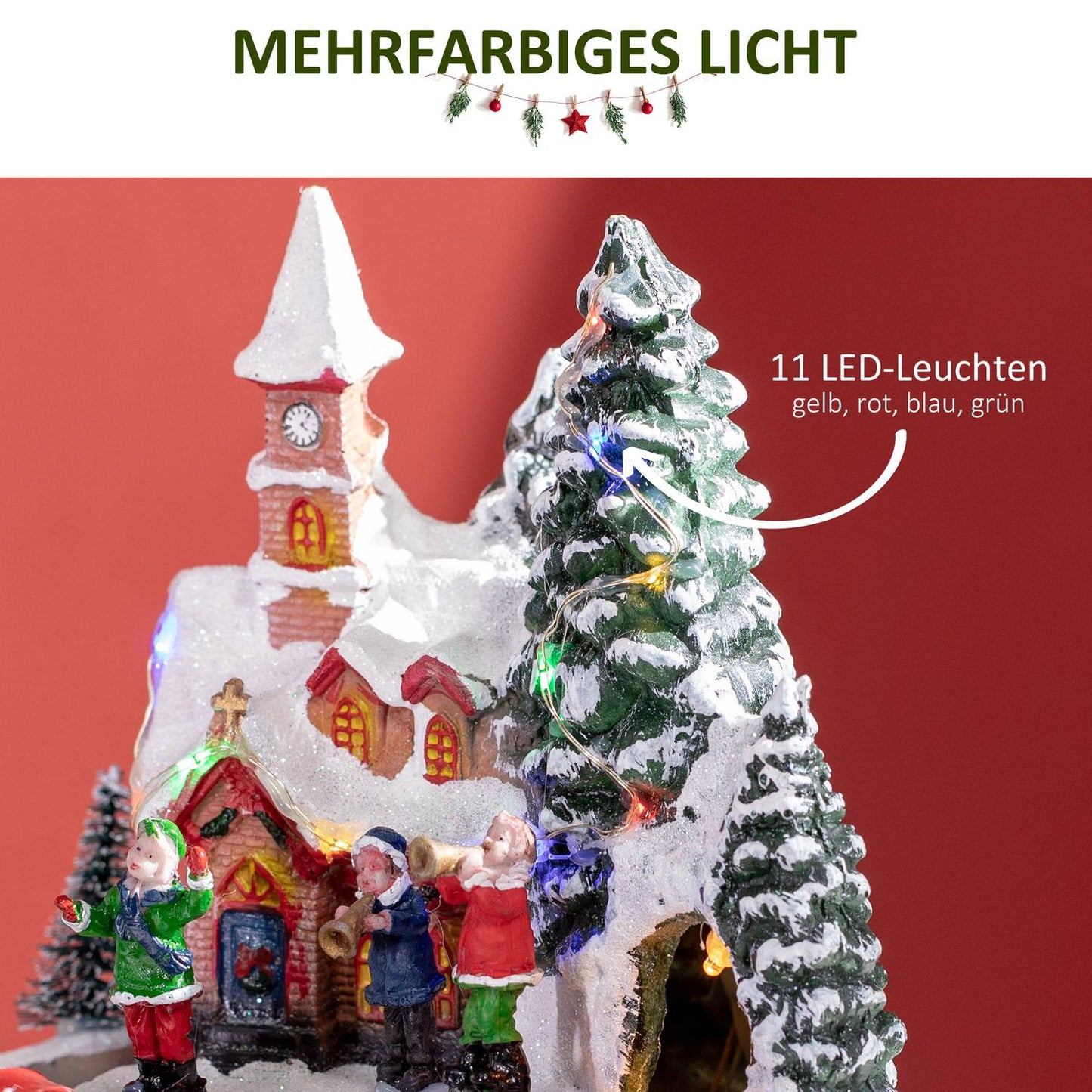Christmas village with LED lights and moving train