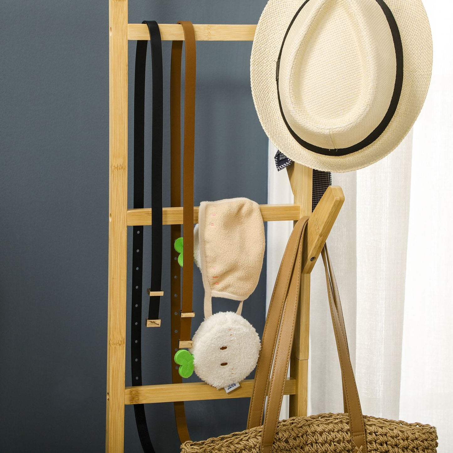 Bamboo clothes rack on wheels with shelf and hooks