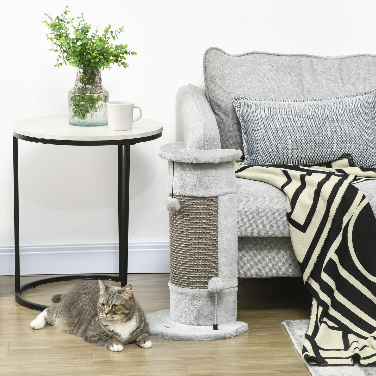 Small gray indoor cat scratching post with sisal ball
