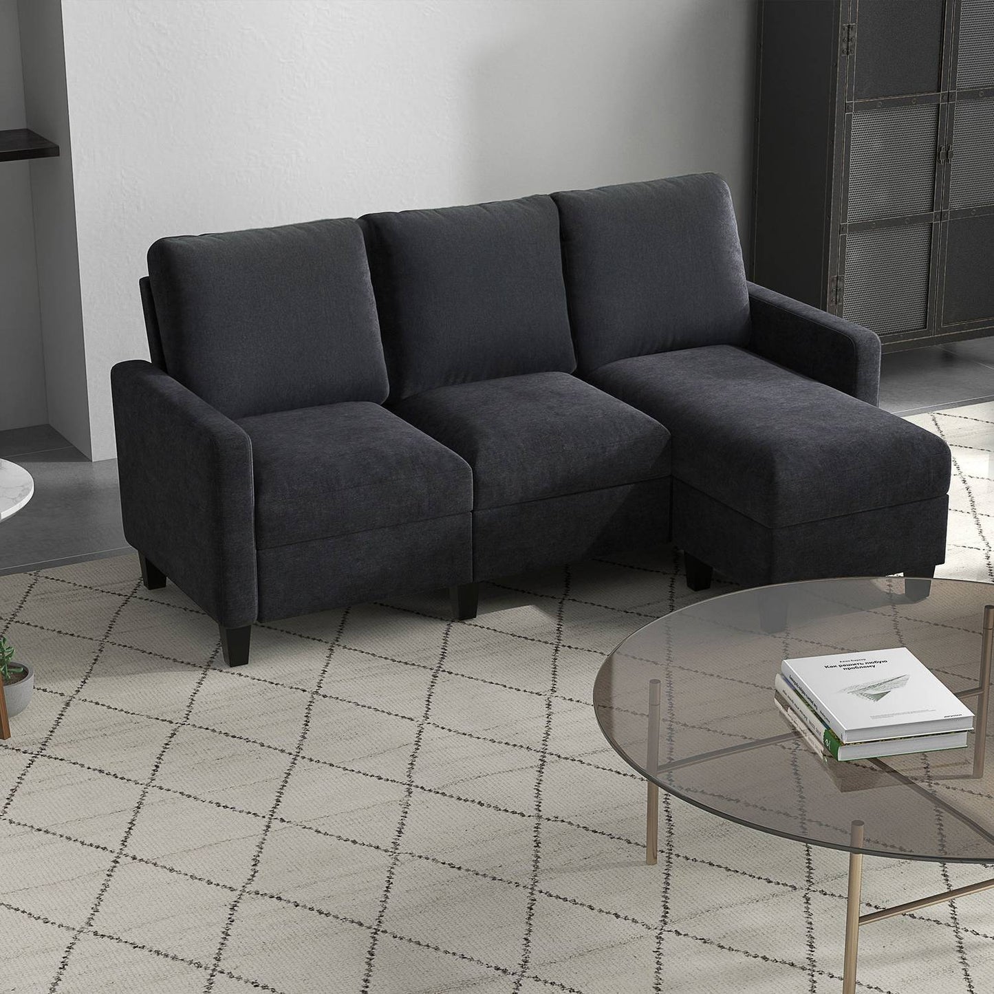Dark gray reversible L-shaped fabric sofa with chaise longue