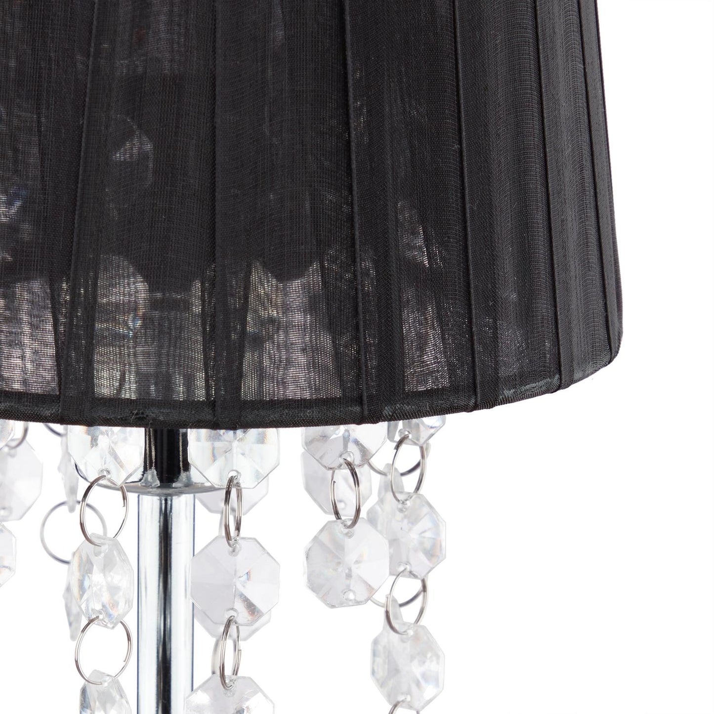 <p>Enhance your space with a table lamp featuring crystal accents and an organza shade, offering ambient lighting and a touch of elegance. Perfect for living rooms and bedrooms, this lamp transforms any room.</p>

<ul>
<li>Illuminate with a black organza