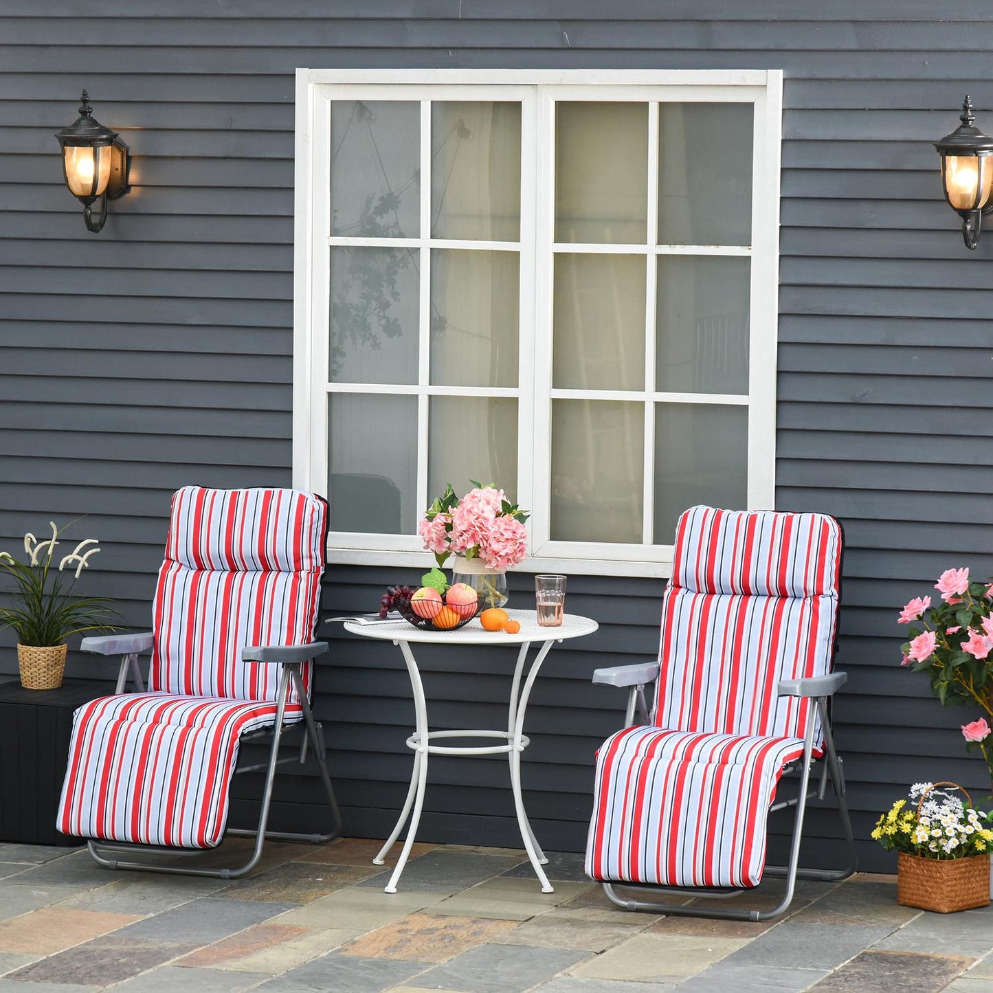 Set of 2 red folding sun loungers with cushions and adjustable backrest