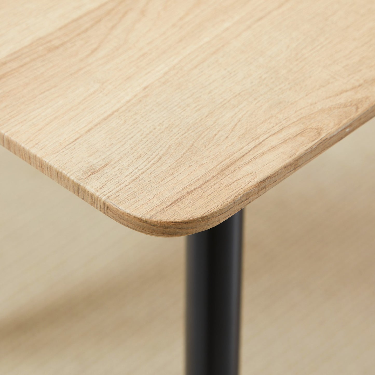 Modern dining table for 4, black wooden look, steel legs