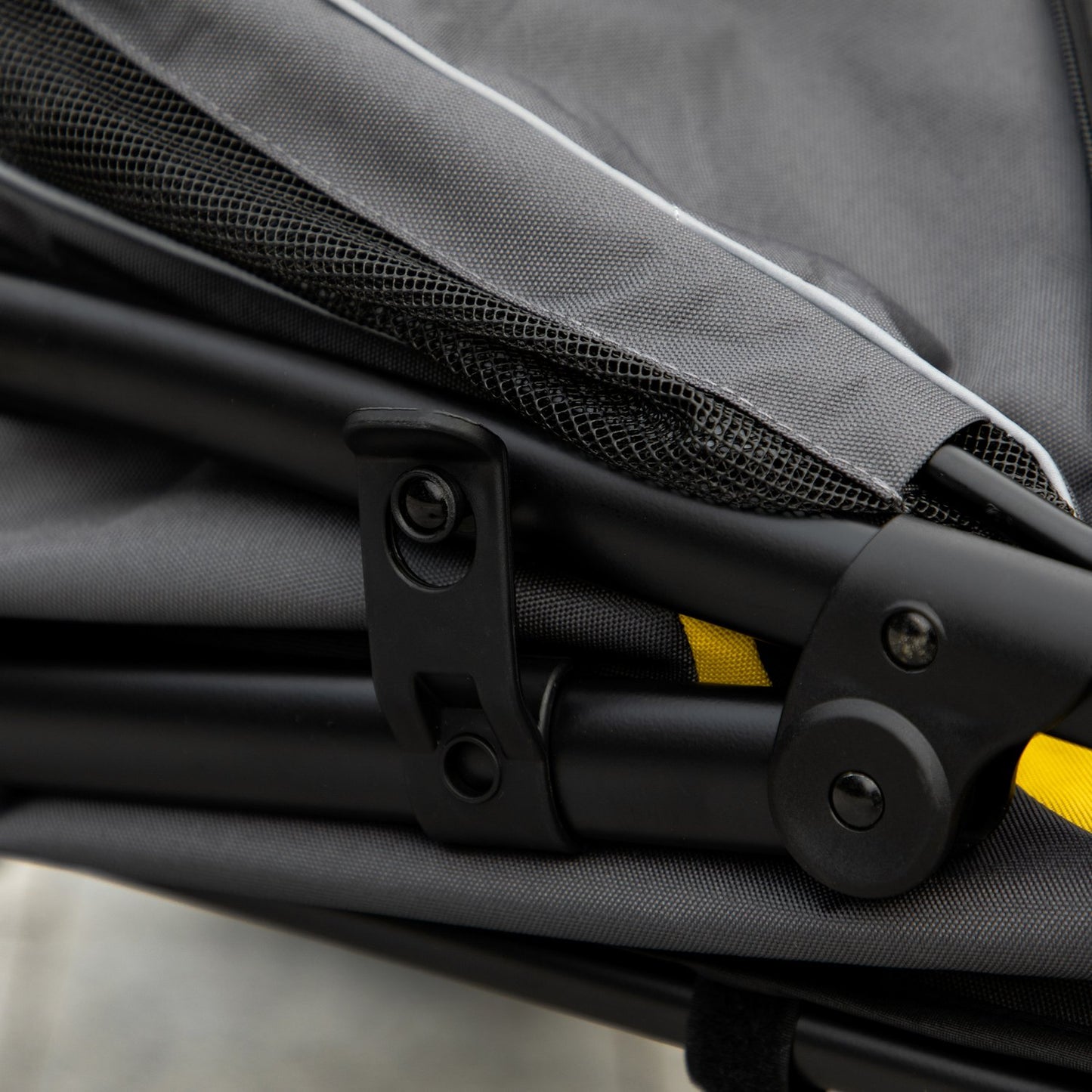 Collapsible pet stroller with cushion and mesh window, gray