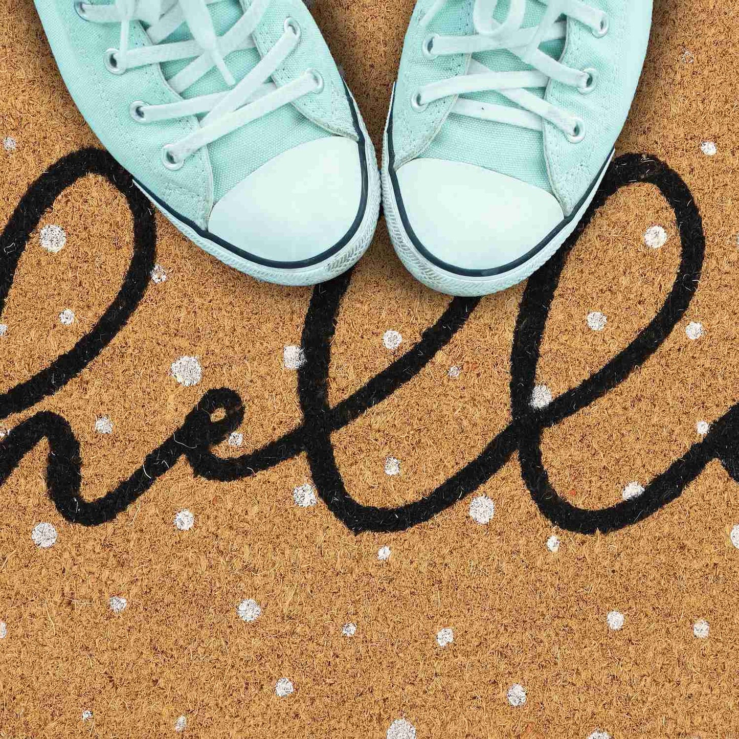 Door mat in spotted coconut Hello