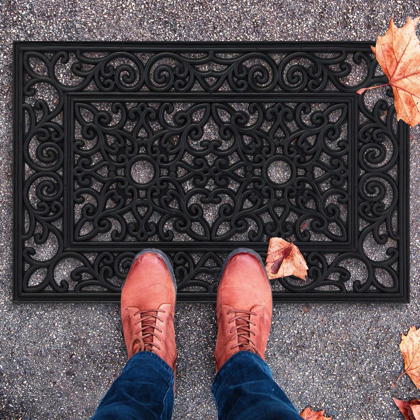 Door mat made of rubber with ornaments