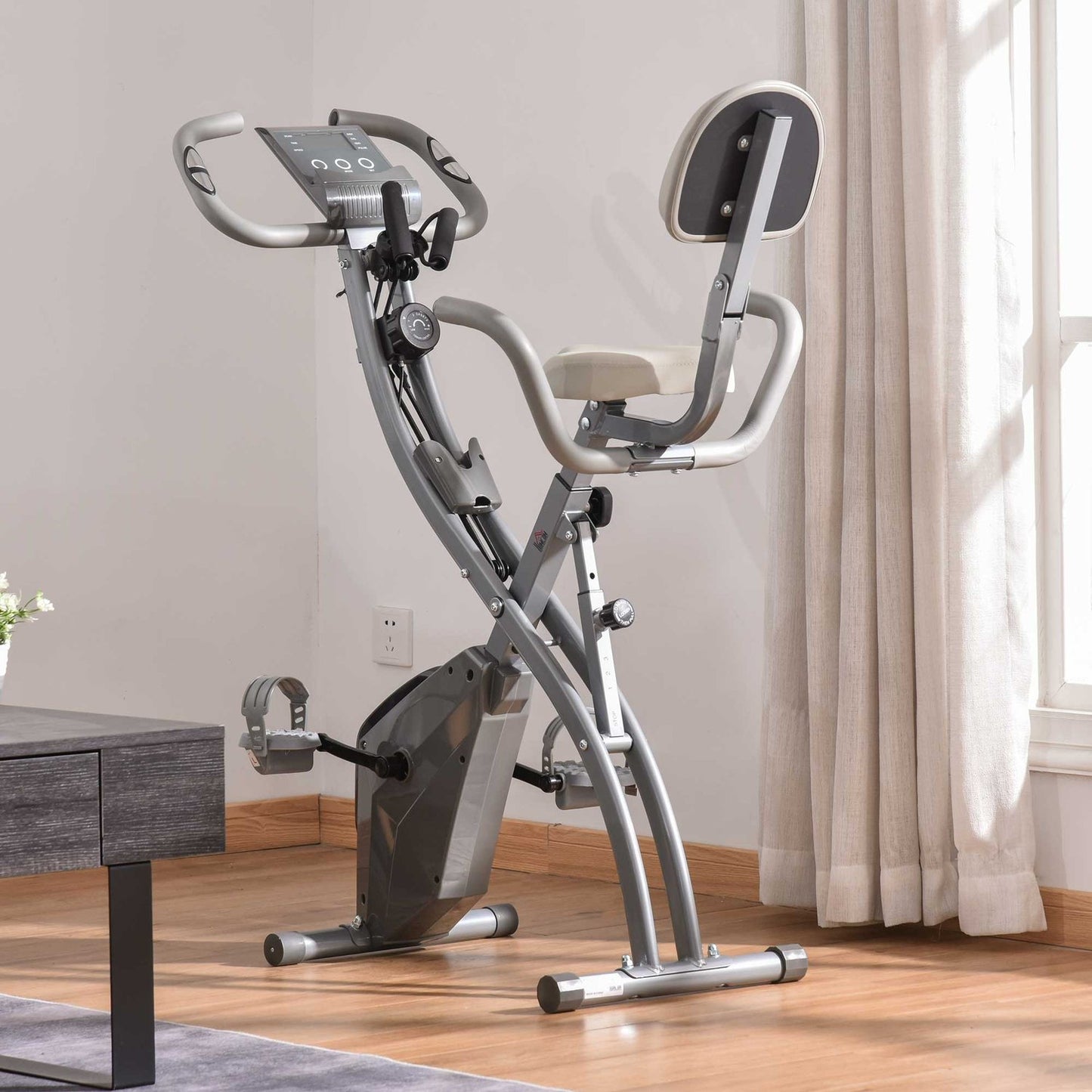 Exercise bike - adjustable resistance, compact design