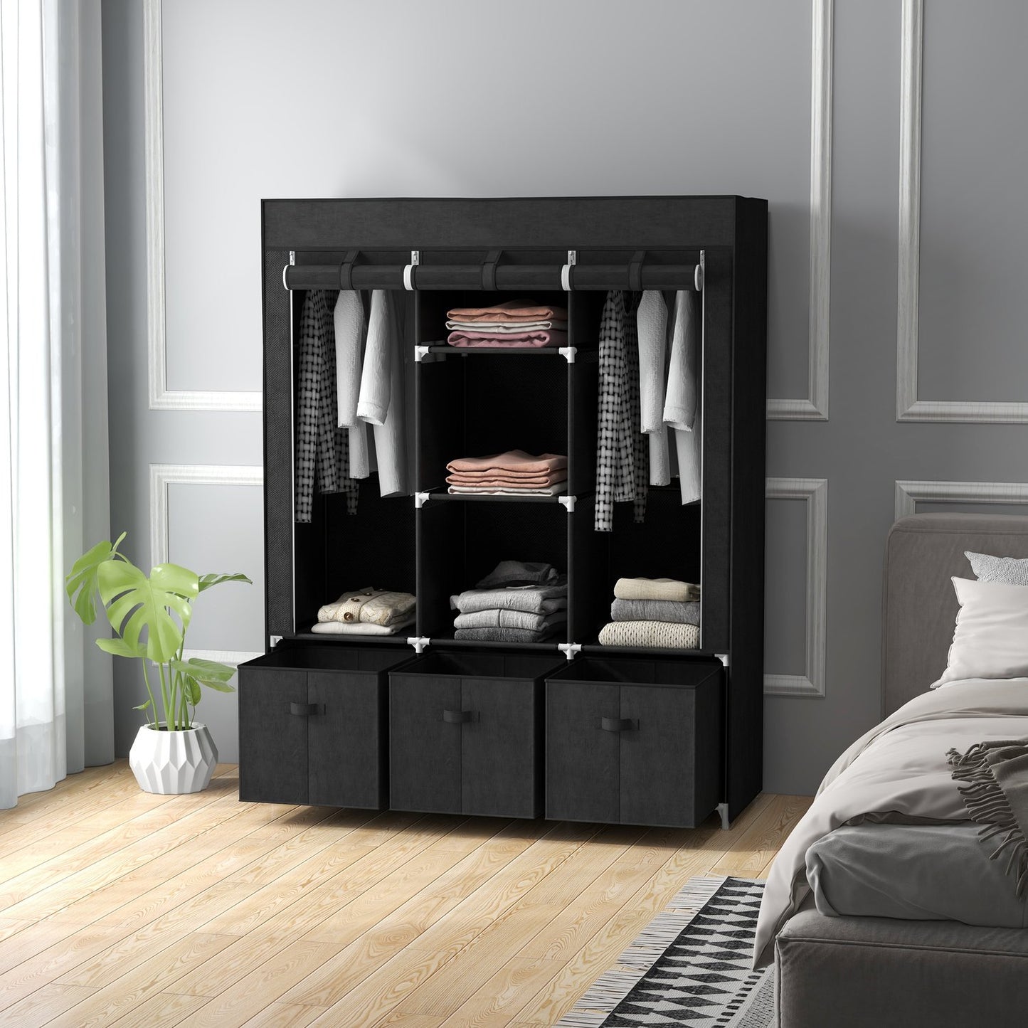 Black fabric wardrobe with rails and drawers