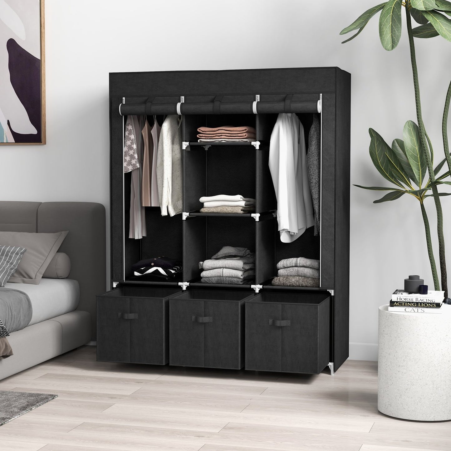 Black fabric wardrobe with rails and drawers