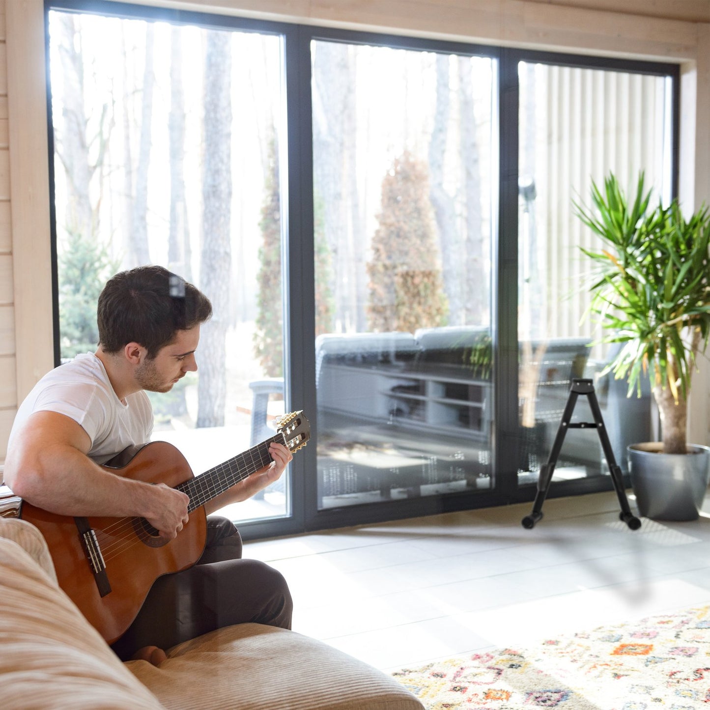 Folding guitar stand