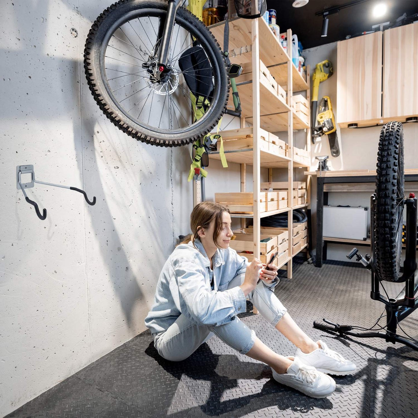 Folding wall bracket for bicycle