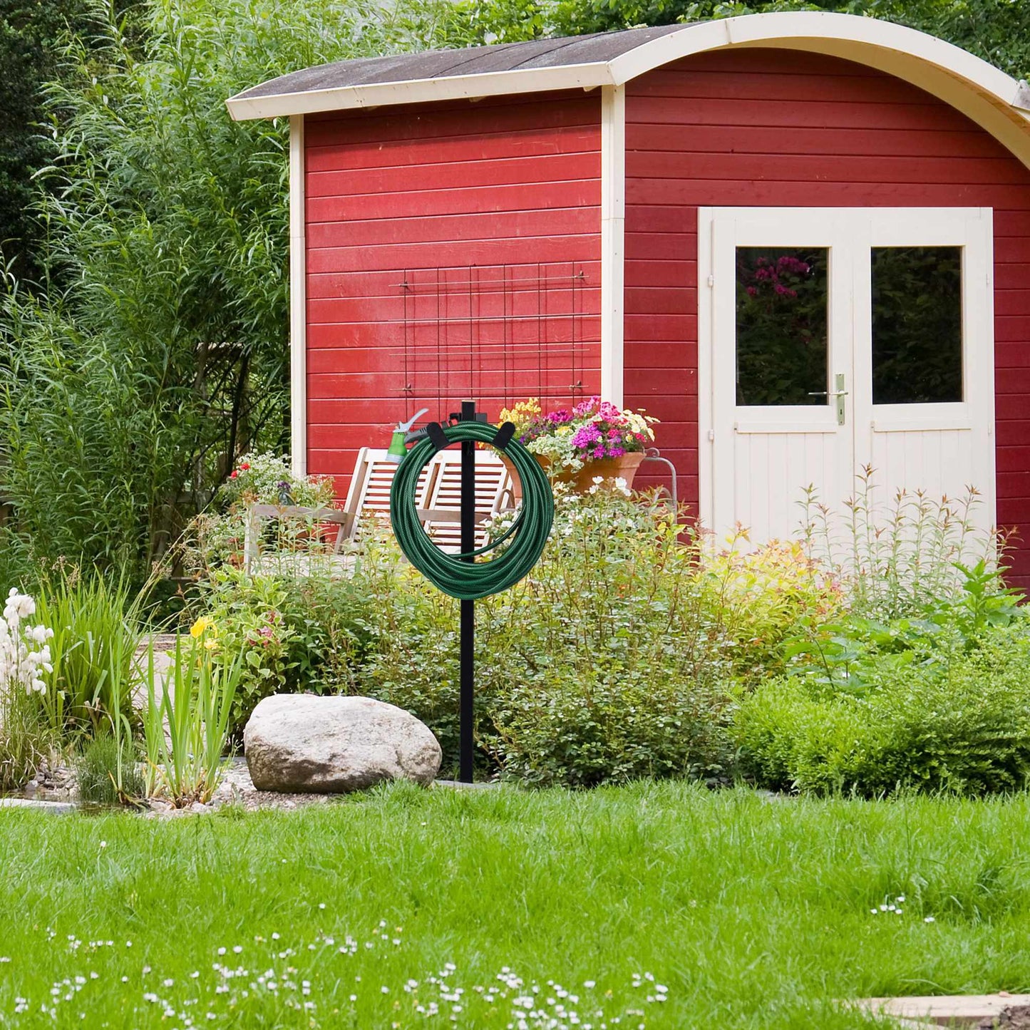 Freestanding hose holder
