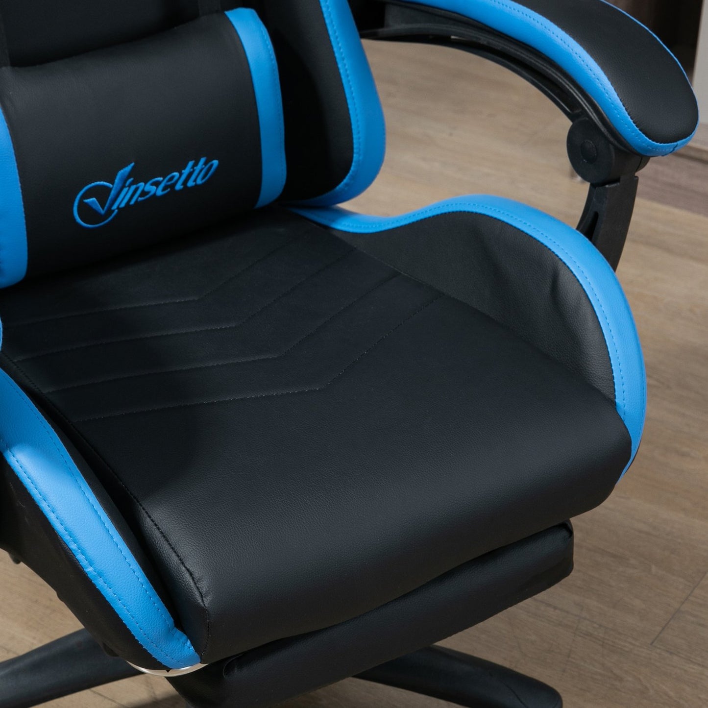Ergonomic gaming chair with lumbar support and footrest