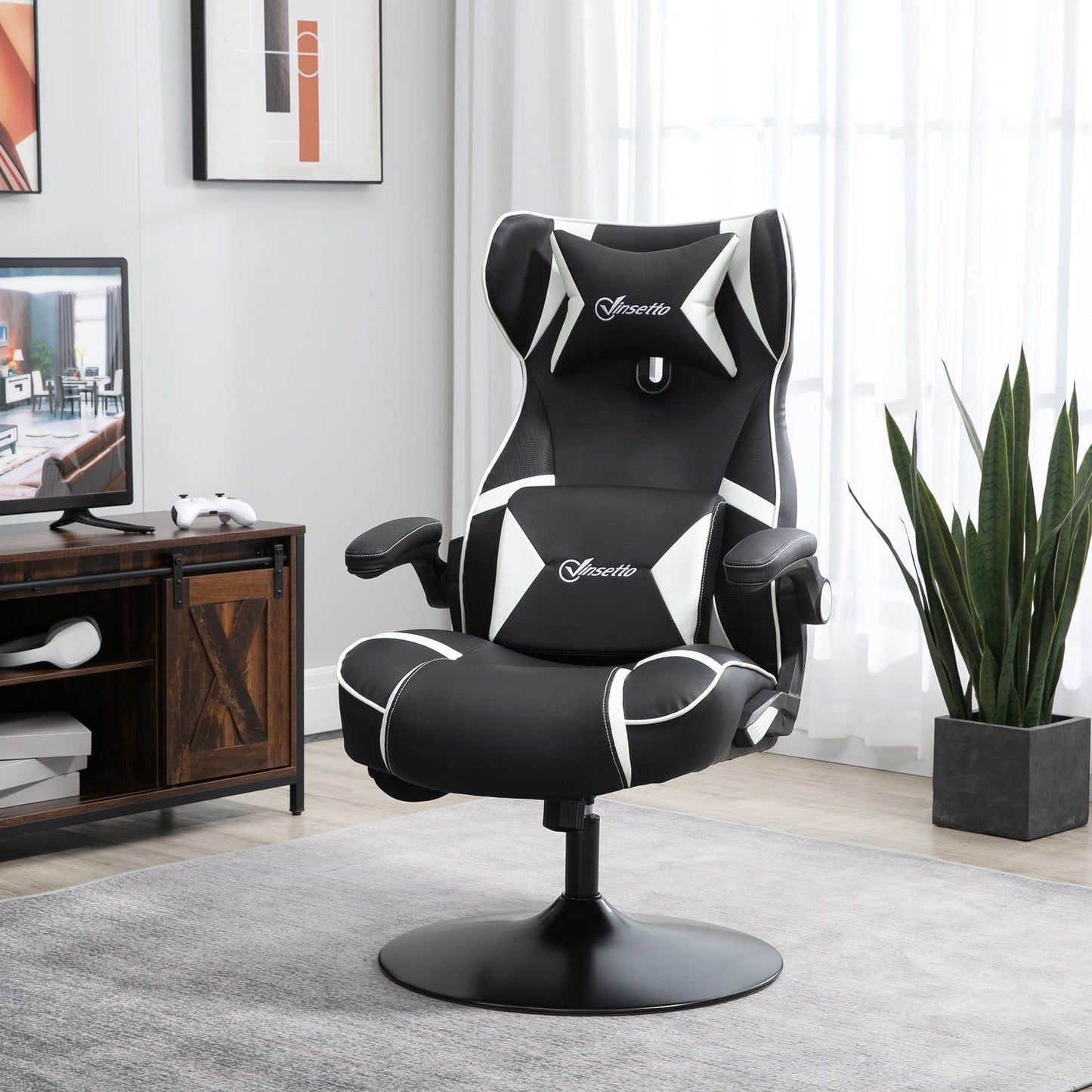 Ergonomic gaming chair with speakers, adjustable height, artificial leather