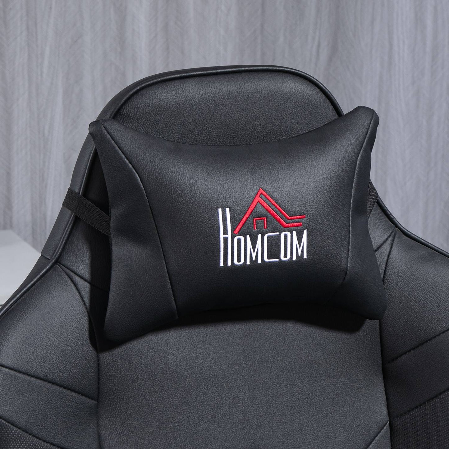 Gaming chair with massage and footrest, black leather look