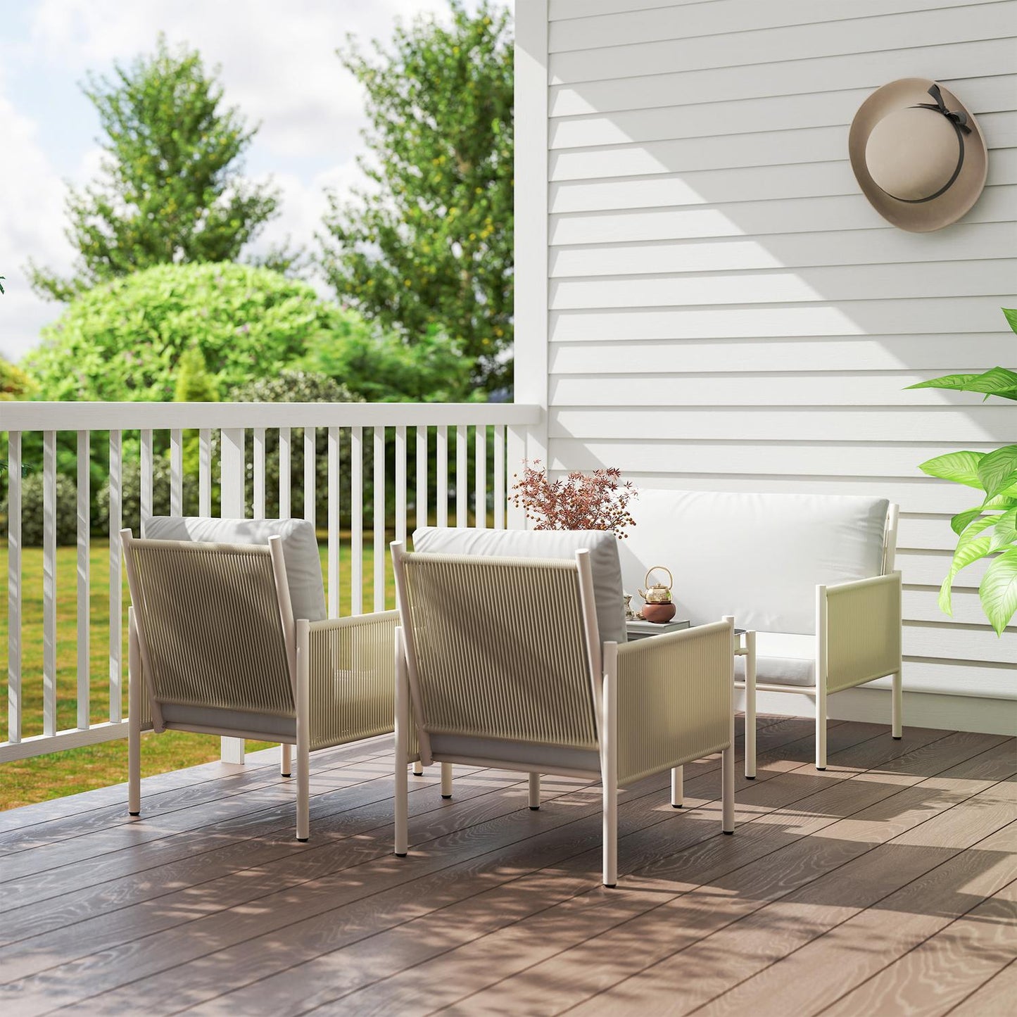 Outdoor poly rattan lounge set with cushions, seats 4