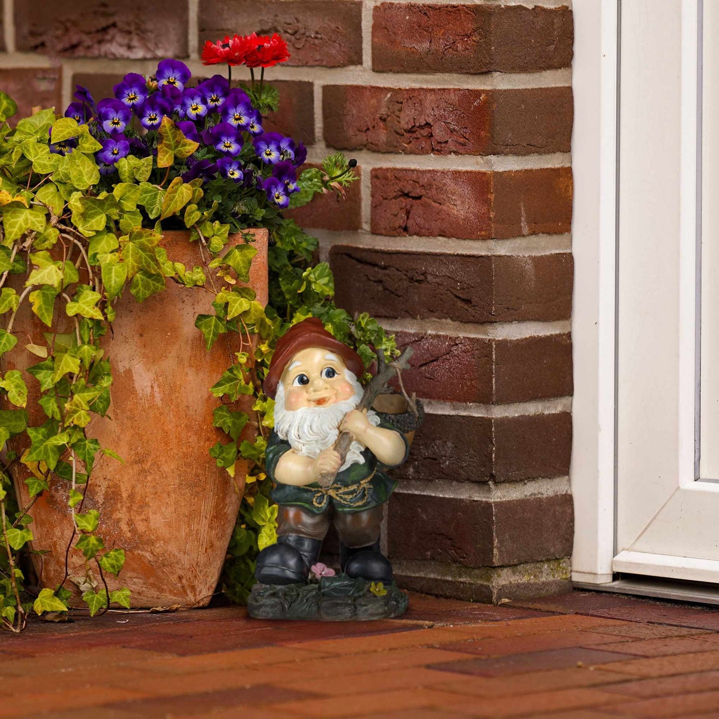 Garden gnome with acorn basket