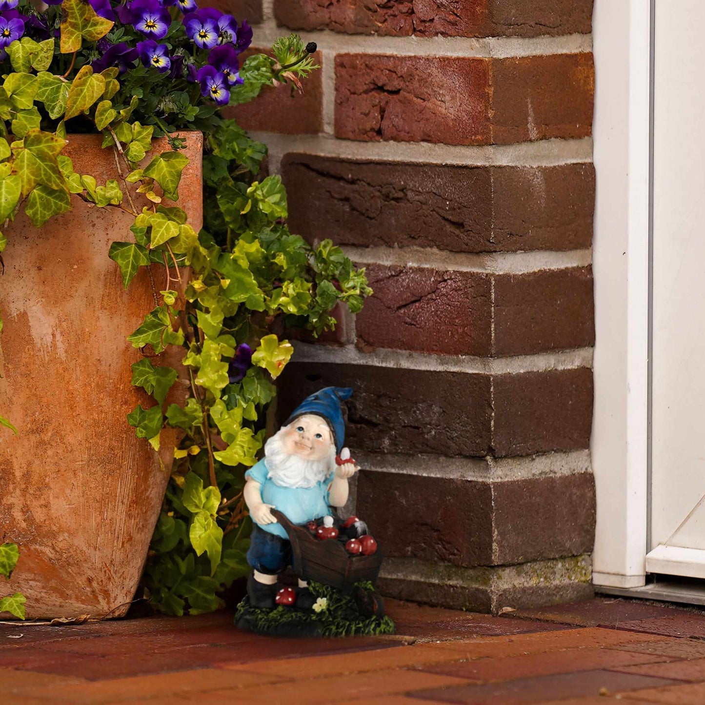 Garden gnome with mushrooms
