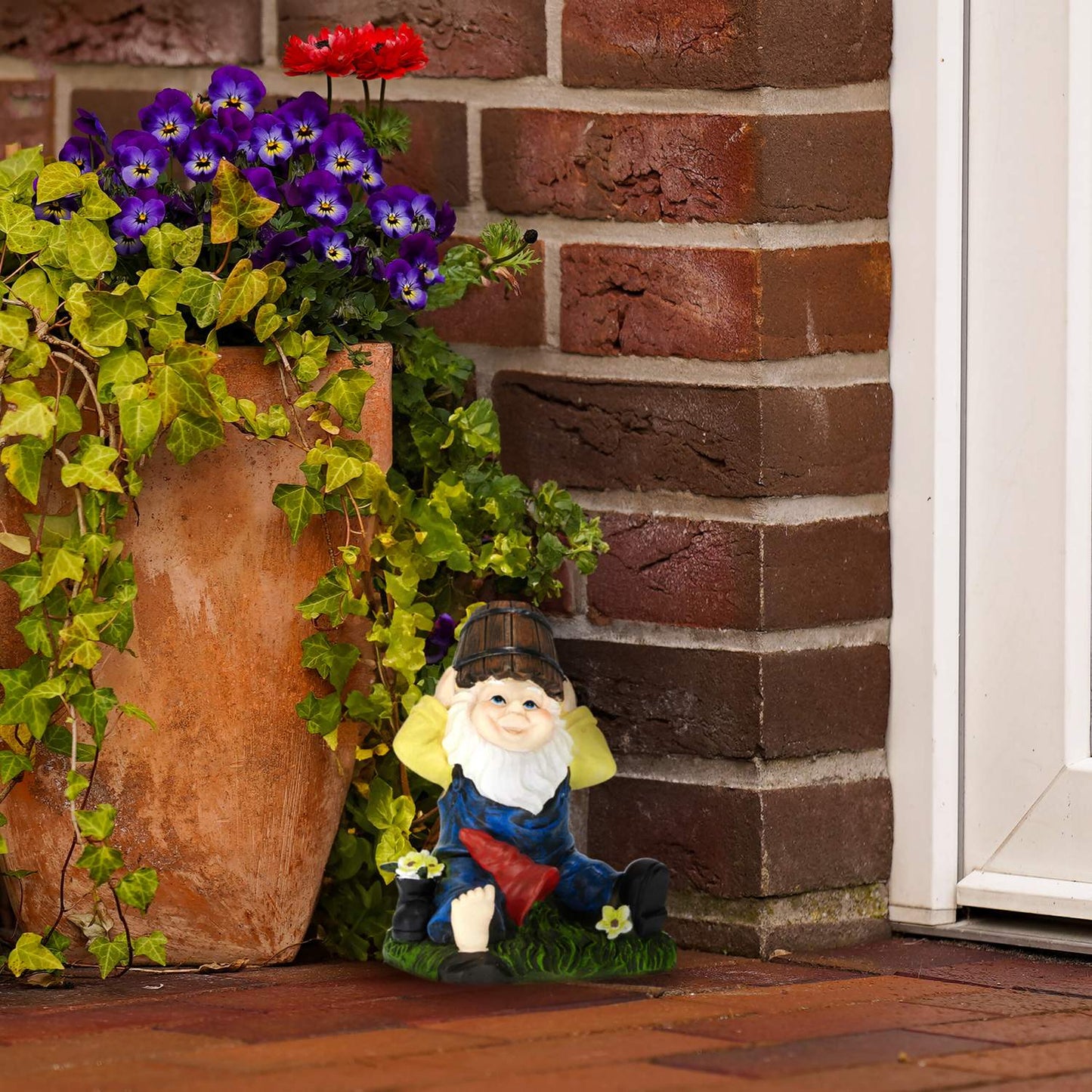 Garden gnome with water bucket