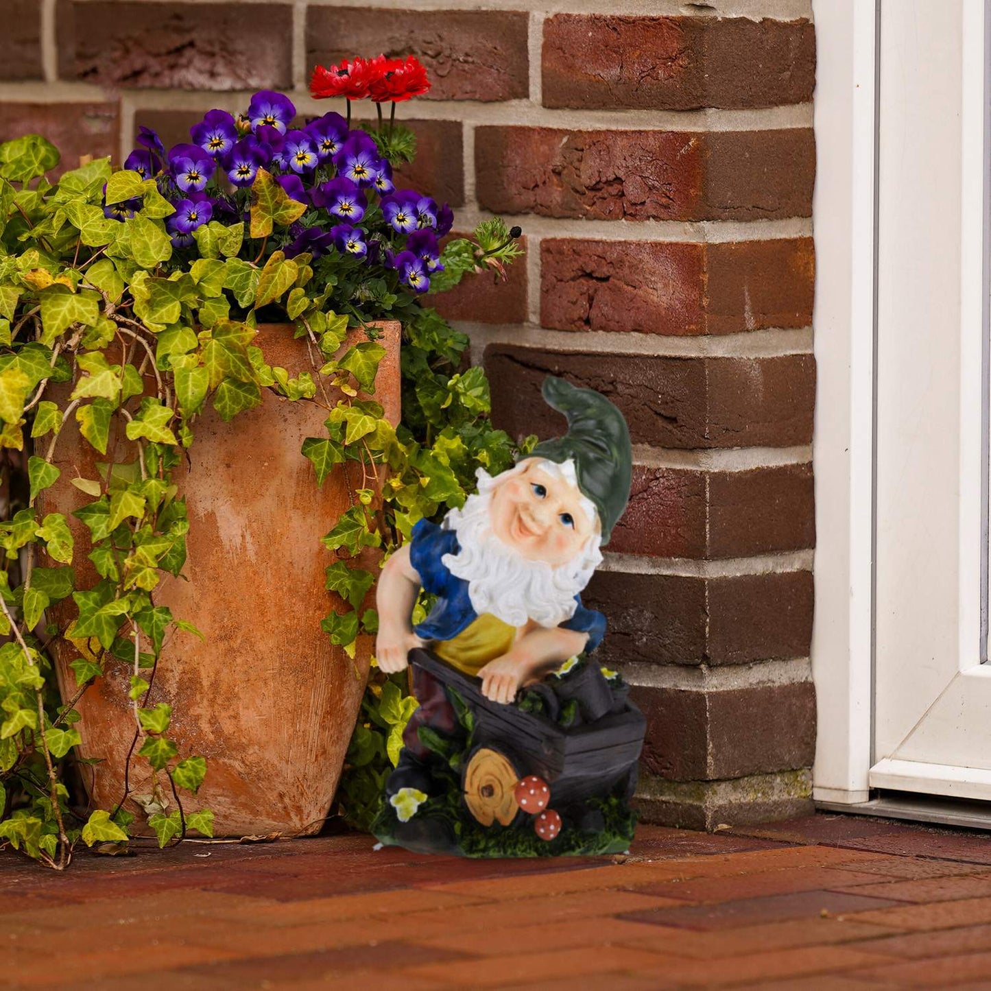 Garden gnome with wheelbarrow