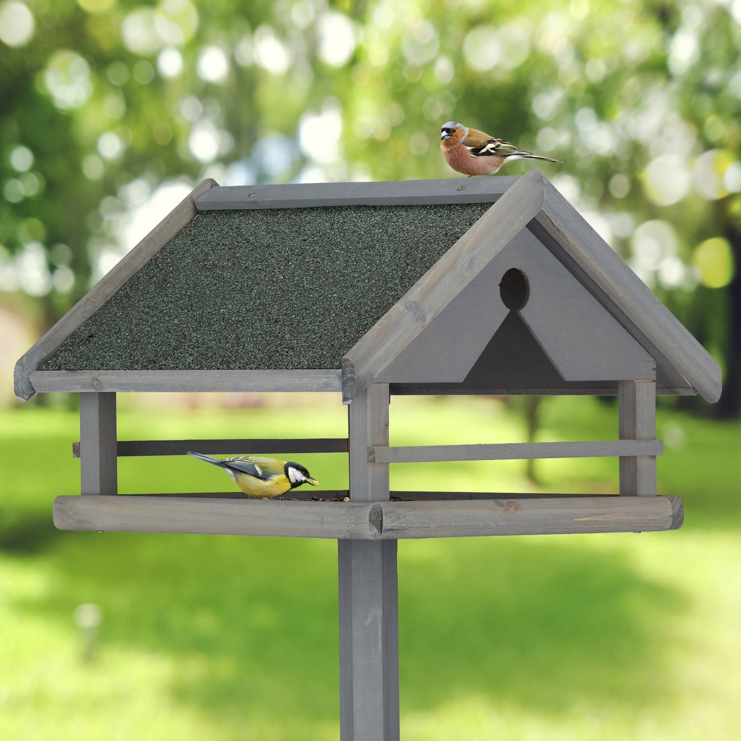 Gray bird table on post