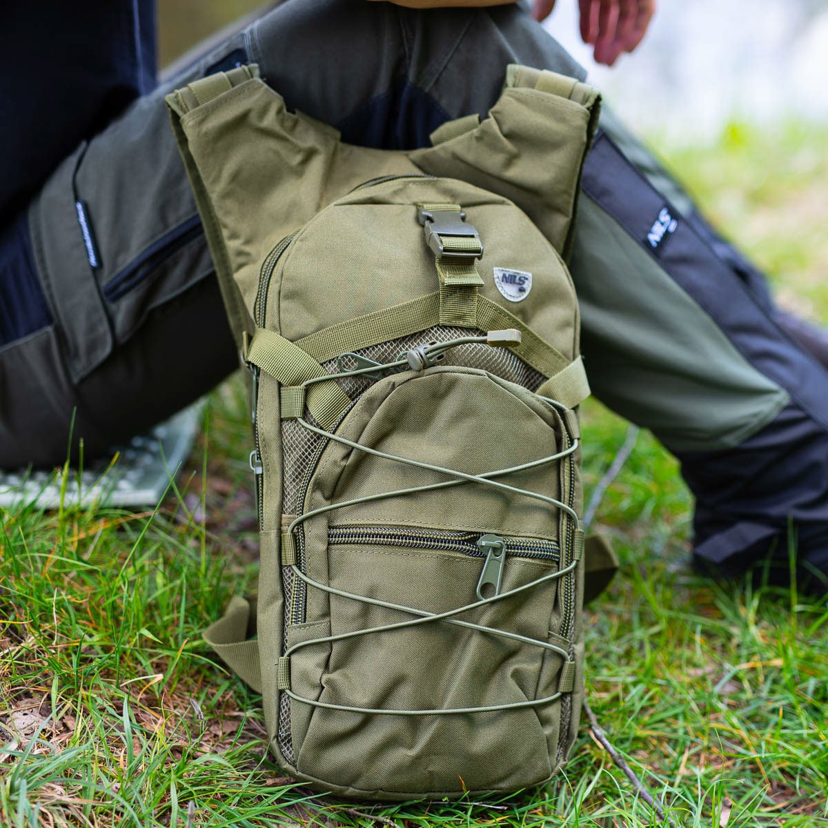Green Backpack, Durable, Spacious, Travel-Friendly