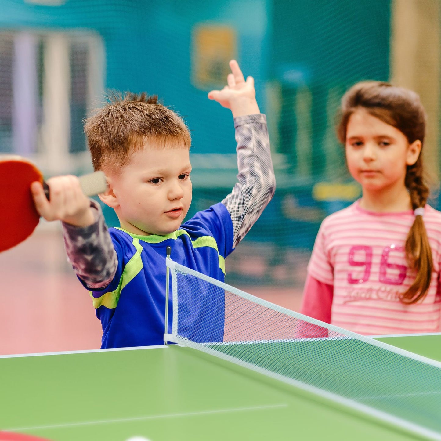 Green ping pong table with accessories