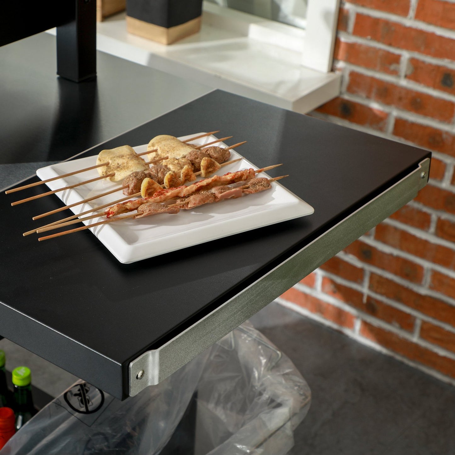 Barbecue cart with folding side table and wheels