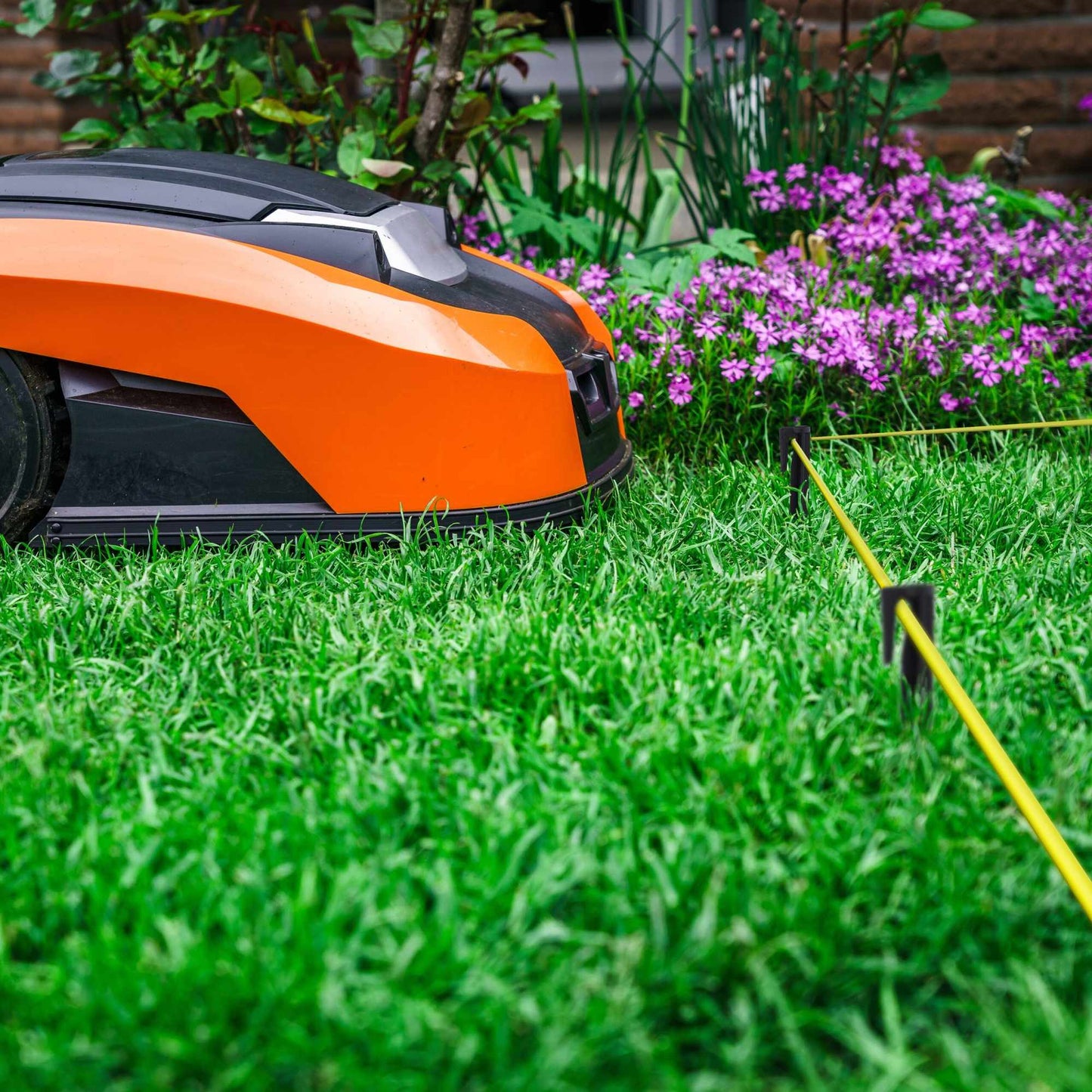 Ground hook for robotic lawnmower boundary cable