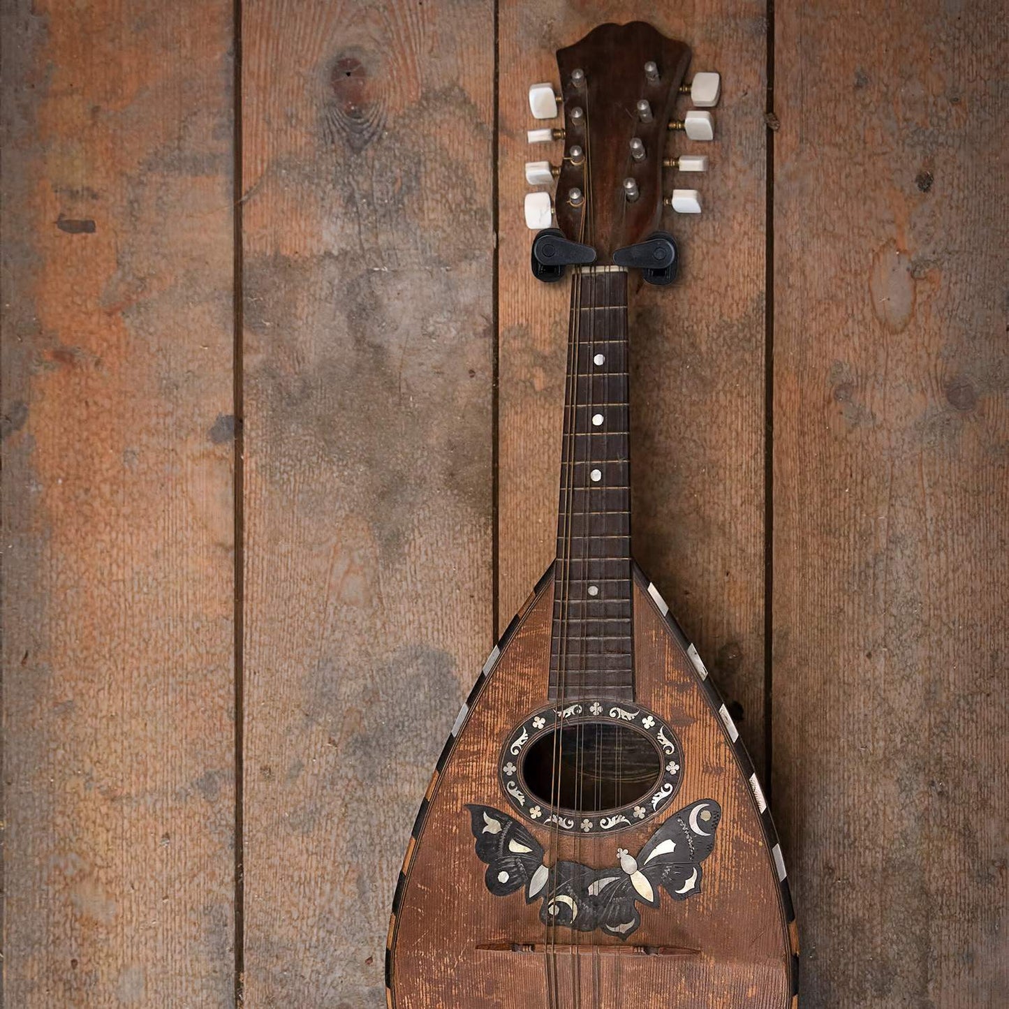 Guitar holder for the wall