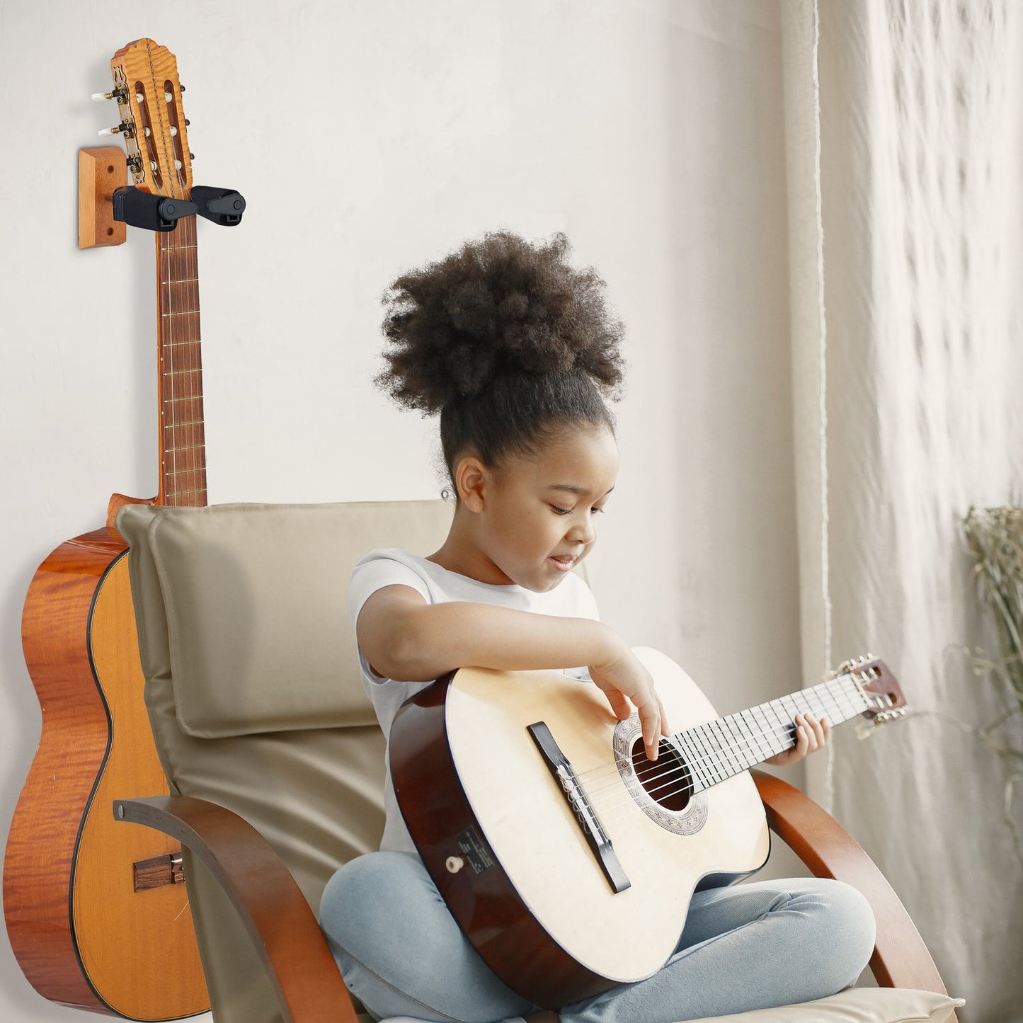 Guitar holder for the wall