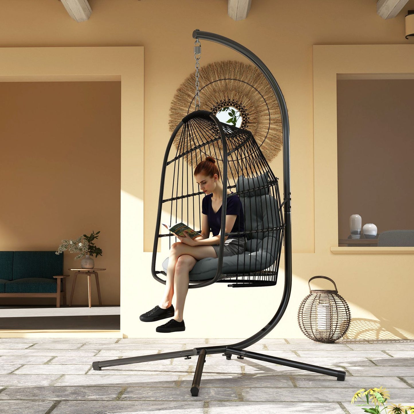 Hanging chair with poly rattan cushion, 150 kg capacity, dark grey