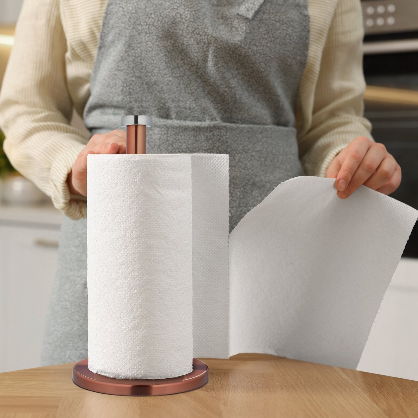 Holder for household paper in stainless steel
