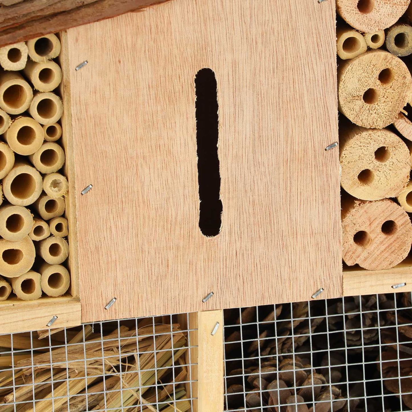 Insect hotel with bark roof