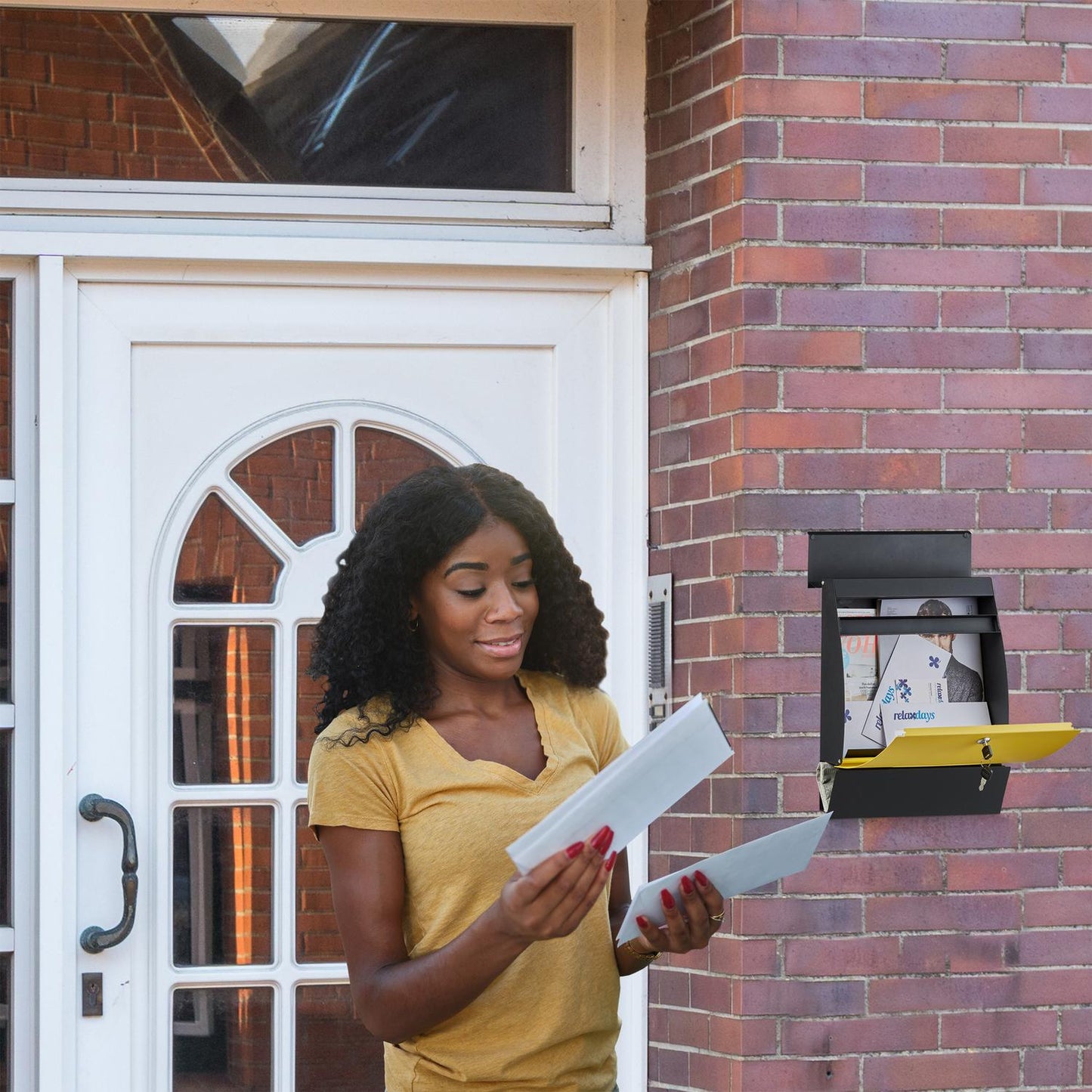 Letterbox with newspaper holder