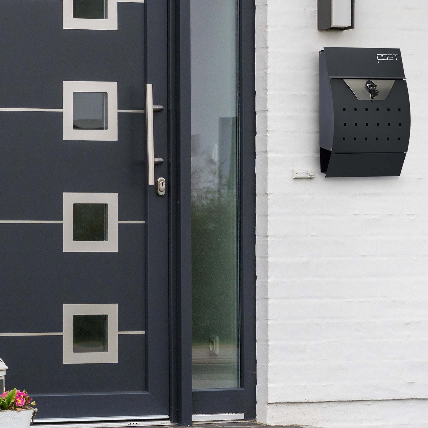 Letterbox with newspaper holder