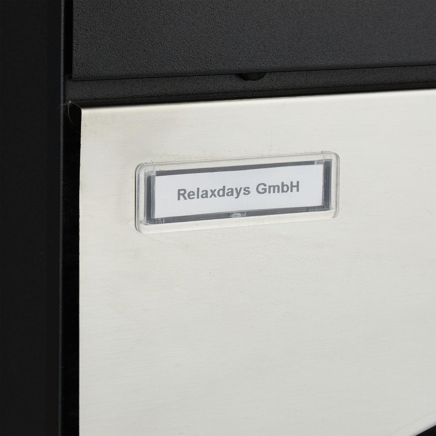 Letterbox with newspaper holder