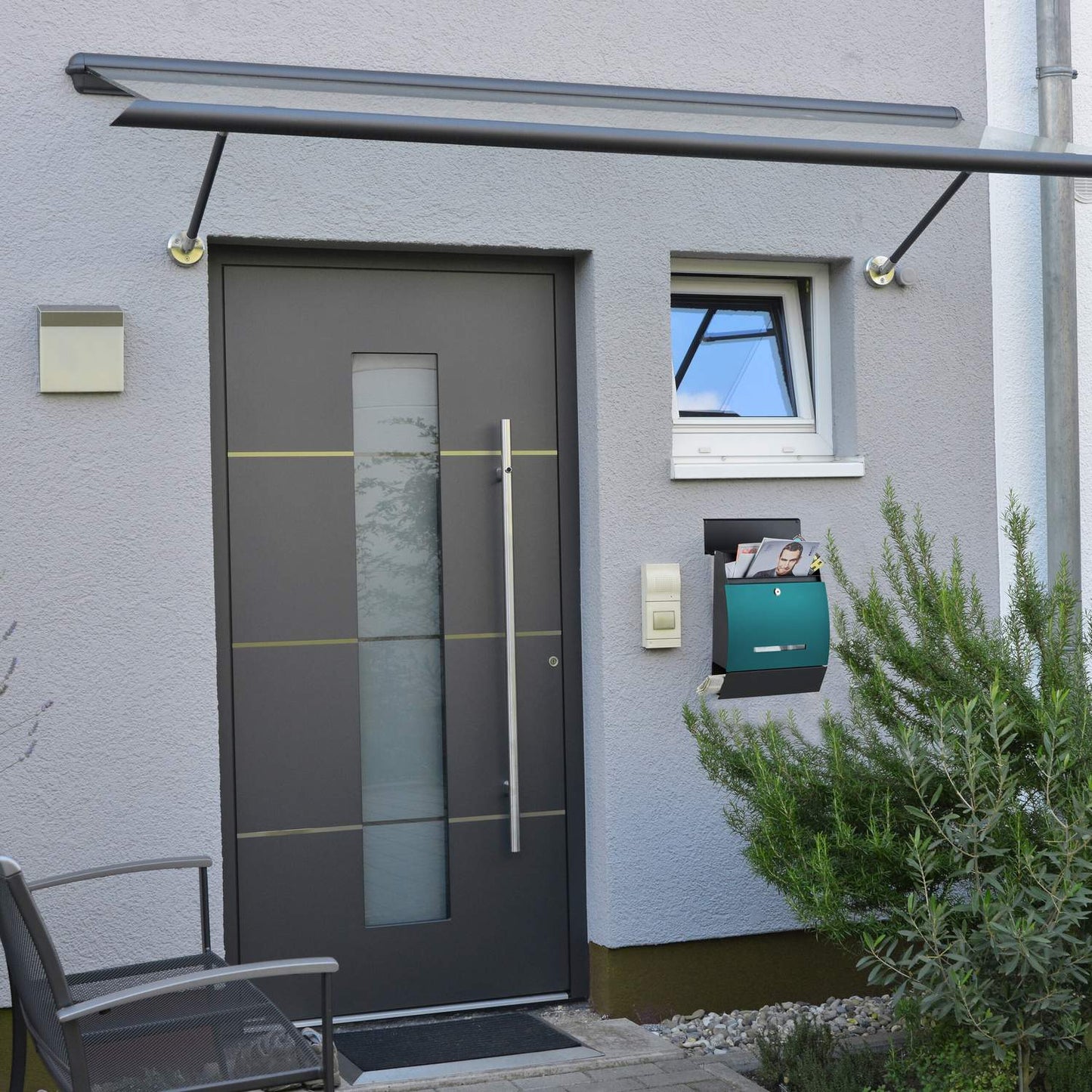 Letterbox with newspaper holder