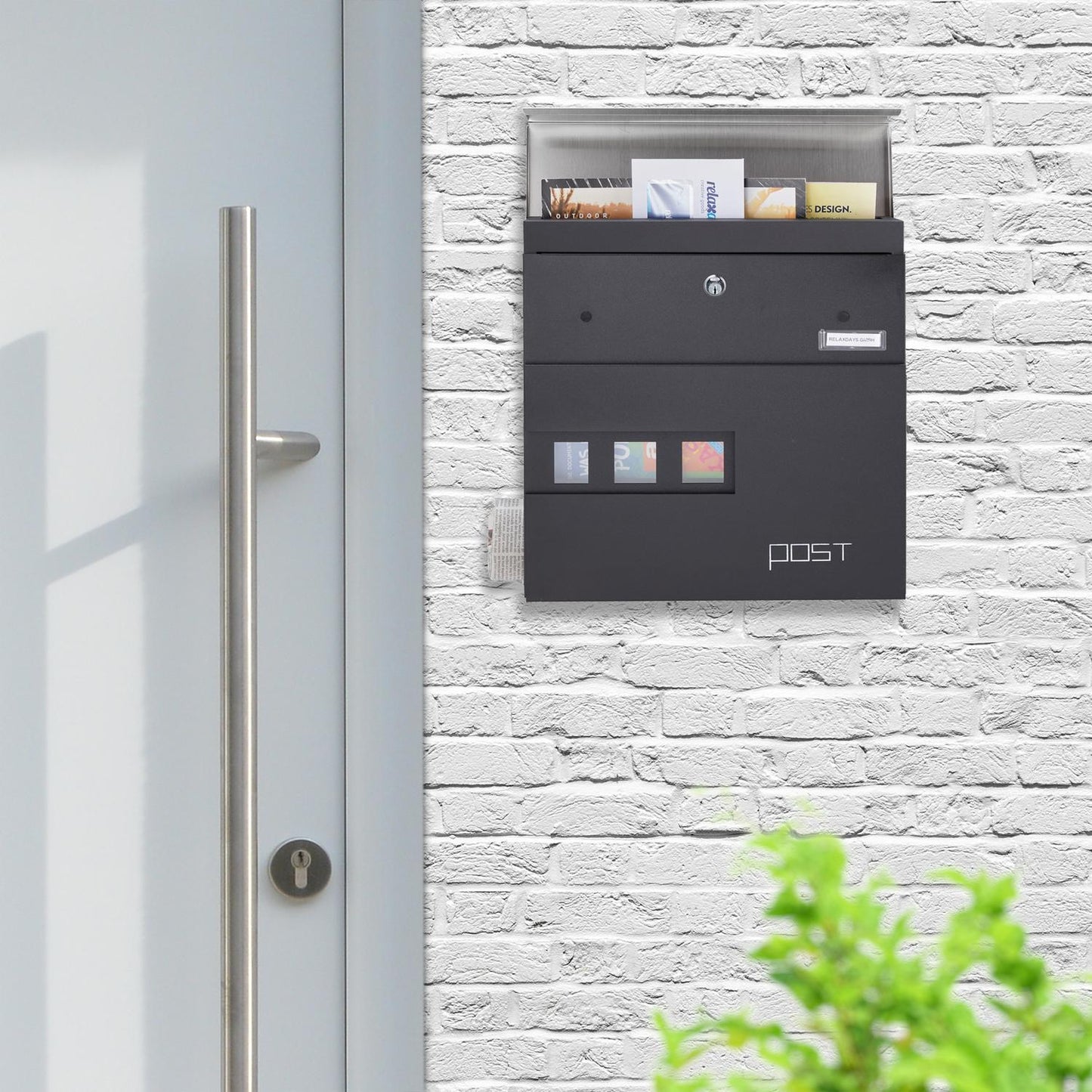 Letterbox with newspaper holder