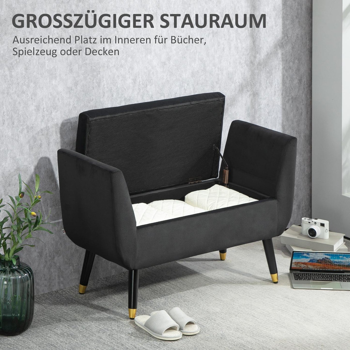 Dark gray velvet upholstered storage bench with armrests