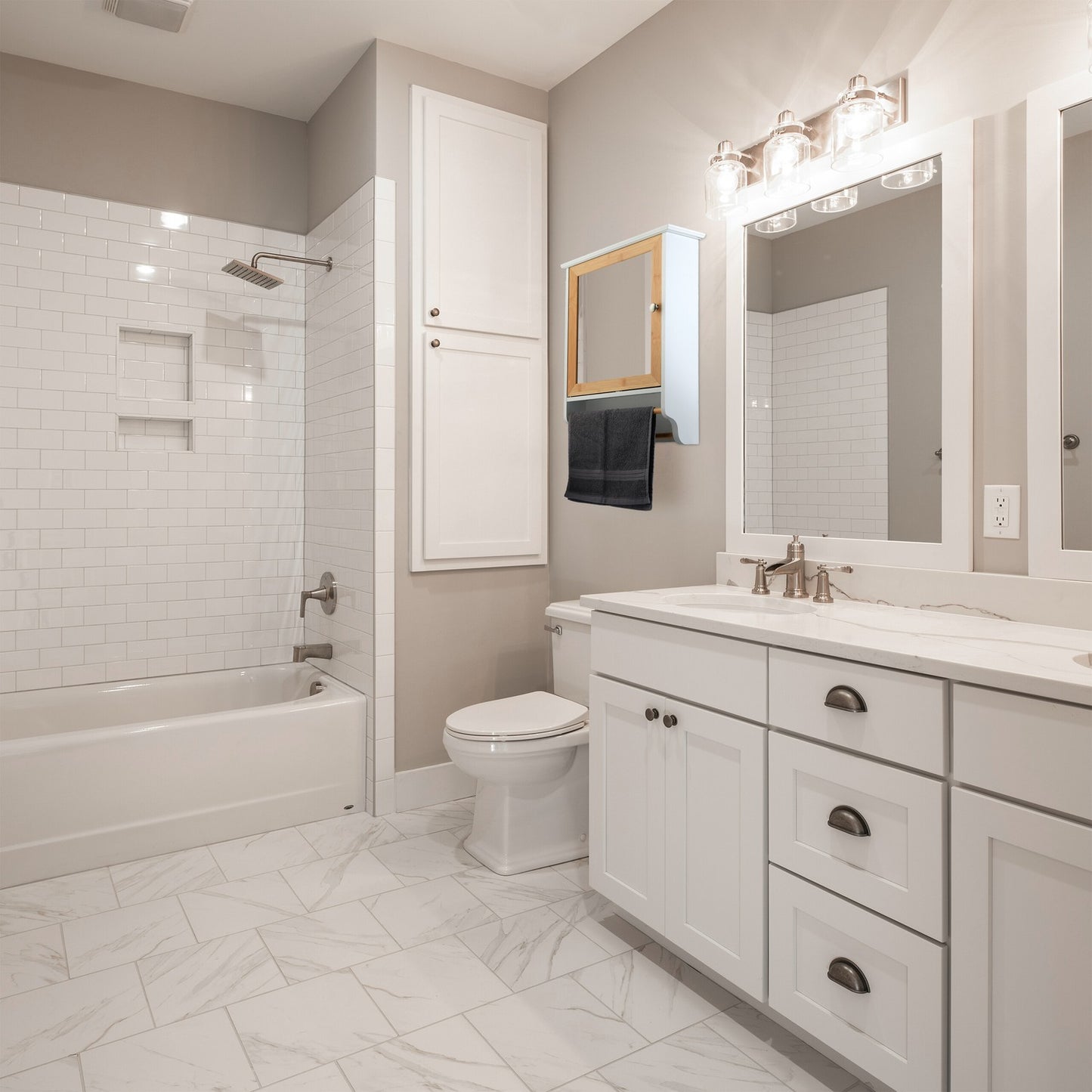 Mirror cabinet with towel holder