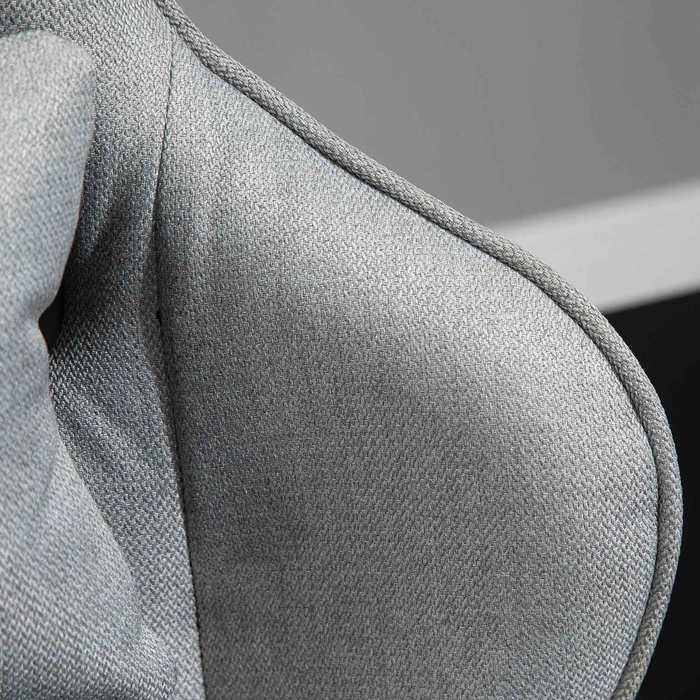 Ergonomic gray office chair with head and lumbar cushions