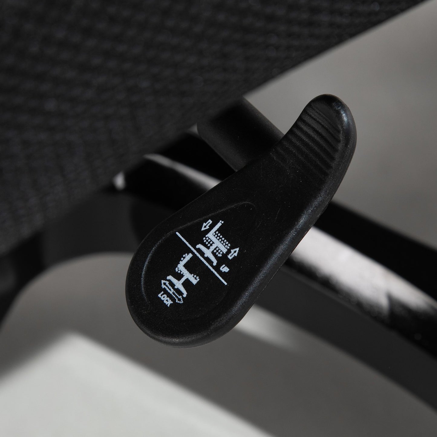 Ergonomic office chair in black artificial leather, adjustable with armrests