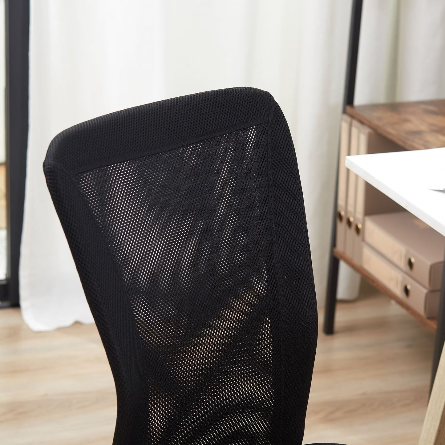 Ergonomic office chair, adjustable, ventilating back, black