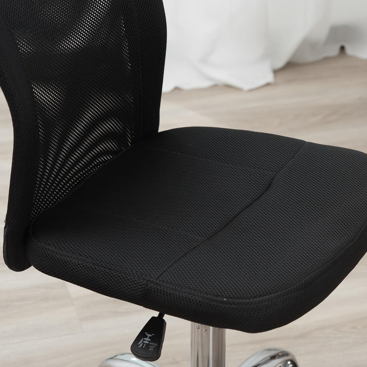 Ergonomic office chair, adjustable, ventilating back, black