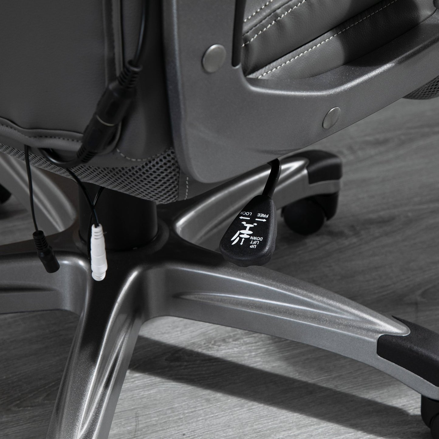 Ergonomic office chair in gray artificial leather with massage